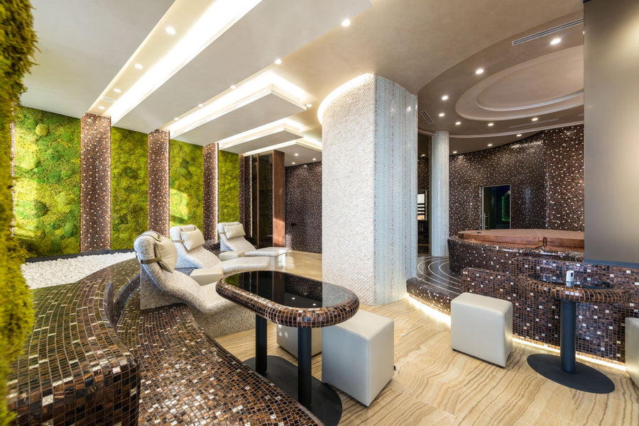 Luxury spa lounge with mosaic finishes and relaxation loungers
